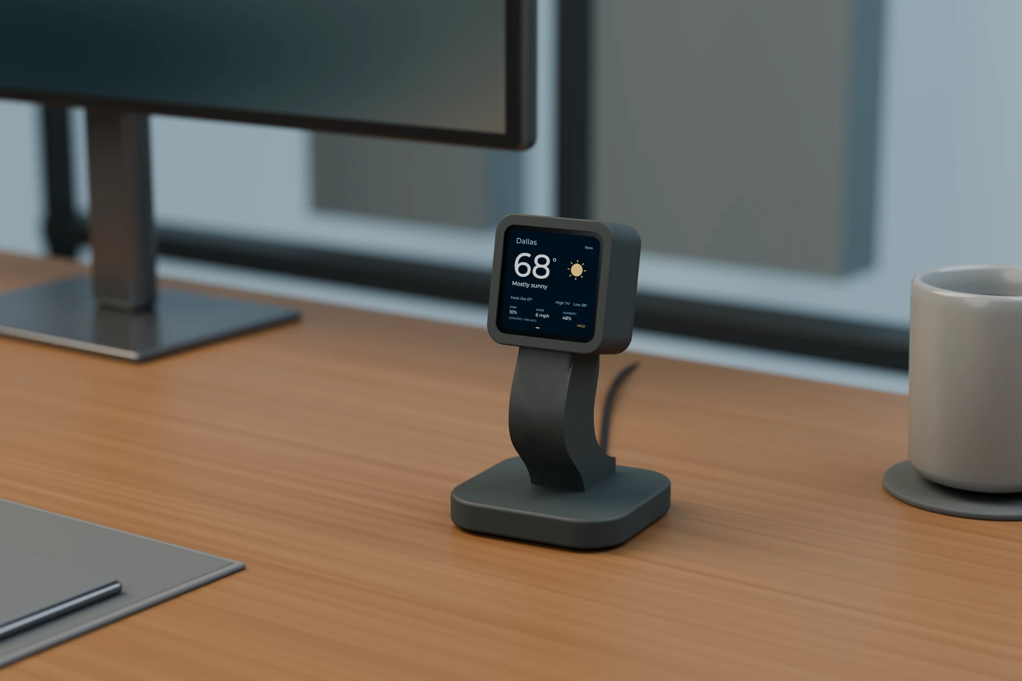 CAD render of the graphite Desk Buddy showing the weather widget on a walnut office desk